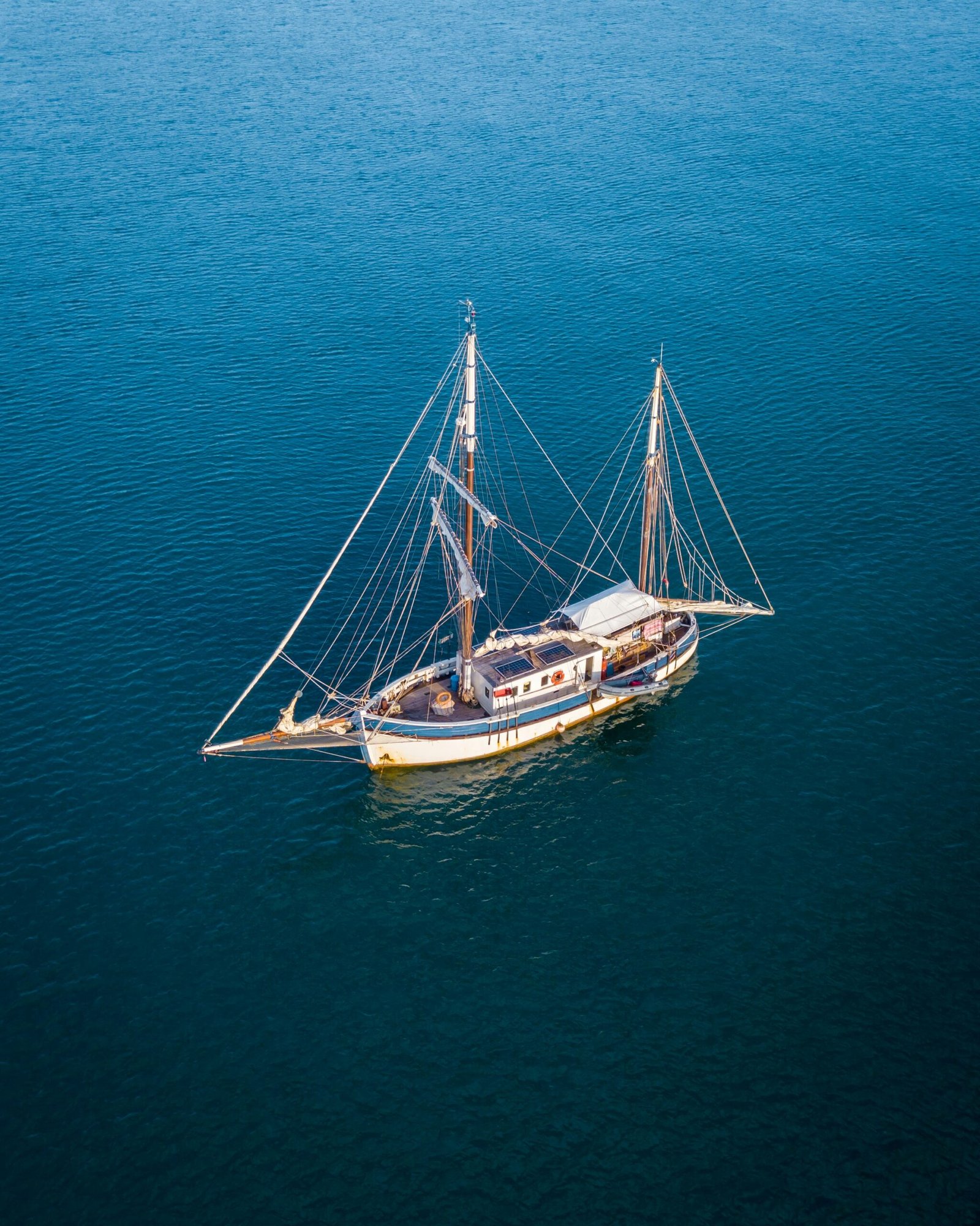 a small boat in a large body of water